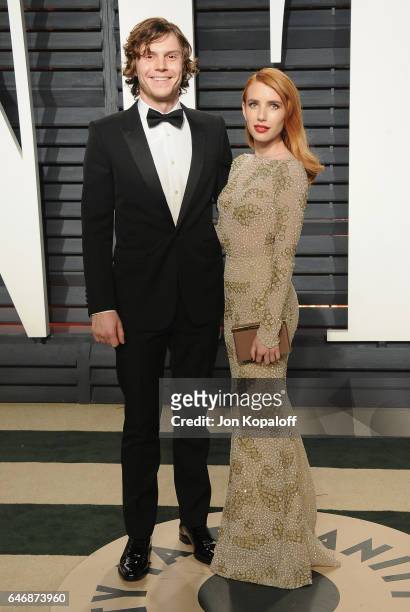 Actor Evan Peters and actress Emma Roberts arrive at the 2017 Vanity Fair Oscar Party Hosted By Graydon Carter at Wallis Annenberg Center for the...