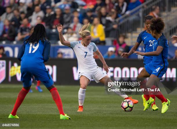 Jordan Nobbs of England controls the ball against Griedge M'bock, Laura Georges, and Grace Geyoro of France in the second half during the SheBelieves...