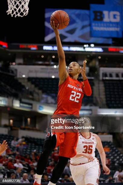 Rutgers guard Louise Ann Borja goes in for the lay up past Wisconsin Badgers center Kendall Shaw during the game game between Rutgers Scarlet Knights...