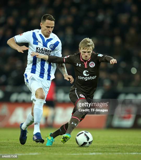 And GERMANY Bjarne Thoelke of Karlsruhe and Mats Moeller Daehli of Pauli battle for the ball during the Second Bundesliga match between FC St. Pauli...