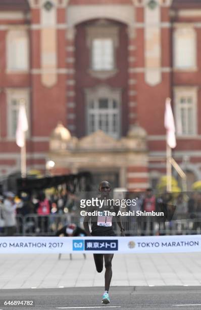 Wilson Kipsang of Kenya crosses the finish tape to win the Men's Marathon during the Tokyo Marathon 2017 on February 26, 2017 in Tokyo, Japan.