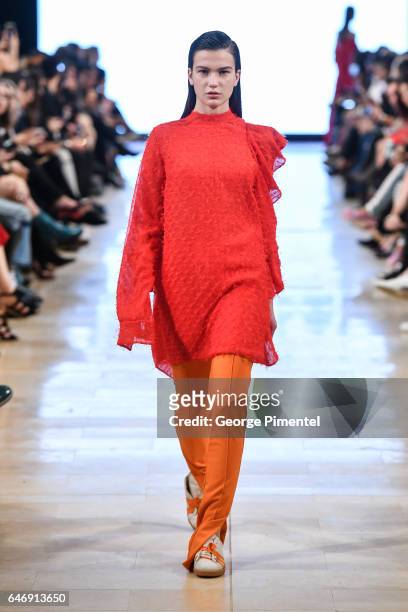 Model walks the runway wearing Mikhael Kale Fall/Winter 2017 at Yorkdale Shopping Centre on March 1, 2017 in Toronto, Canada.