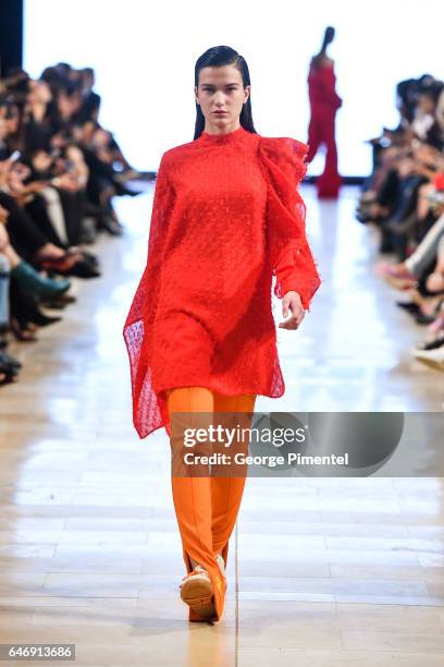 Model walks the runway wearing Mikhael Kale Fall/Winter 2017 at Yorkdale Shopping Centre on March 1, 2017 in Toronto, Canada.