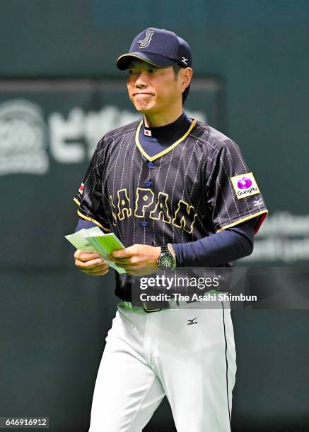 Manager Hiroki Kokubo of Japan calls a pitching change after the top of eighth inning in the SAMURAI JAPAN Send-off Friendly Match between CPBL...