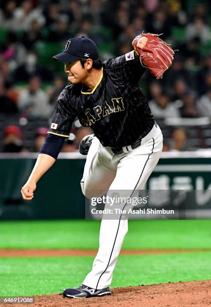 Tomoyuki Sugano of Japan throws during the SAMURAI JAPAN Send-off Friendly Match between CPBL Selected Team and Japan at the Yafuoku Dome on March 1,...