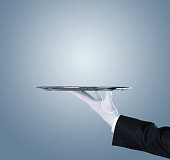 Waiter with an empty tray