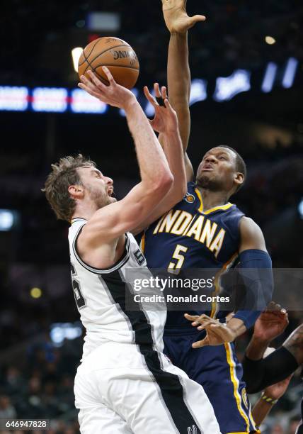 Pau Gasol of the San Antonio Spurs drives on Lavoy Allen of the Indiana Pacers at AT&T Center on March 1, 2017 in San Antonio, Texas. NOTE TO USER:...