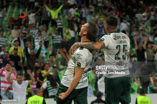 Julio Furch of Santos celebrates with teammate Jorge Enriquez after scoring during the match between Santos Laguna and America as part of the Copa MX...