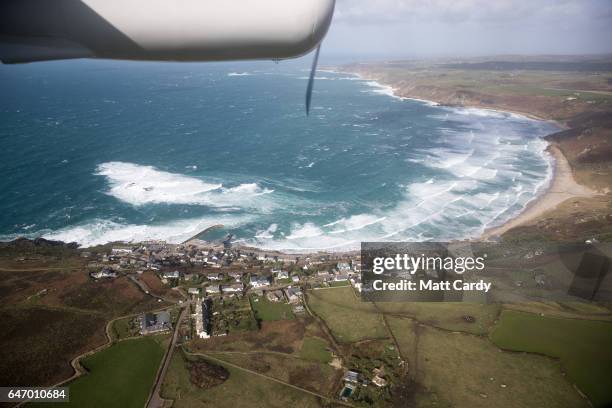 Sennen Cove is seen from the air on February 23, 2017 in Cornwall, England. The temperate Isles of Scilly, with a population of just over 2200, are...