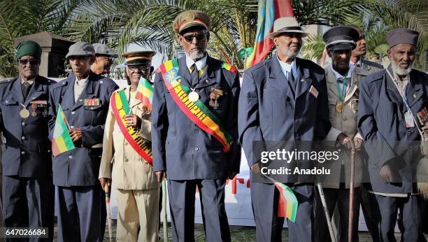 Ethiopian veterans, wearing military uniform and medals, stand next to each other during the celebration of the 121st Anniversary of Ethiopia's...