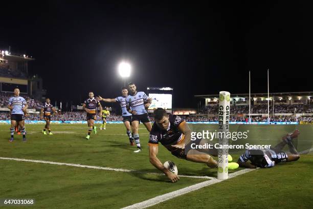 Corey Oates of the Broncos scores a try during the round one NRL match between the Cronulla Sharks and the Brisbane Broncos at Southern Cross Group...