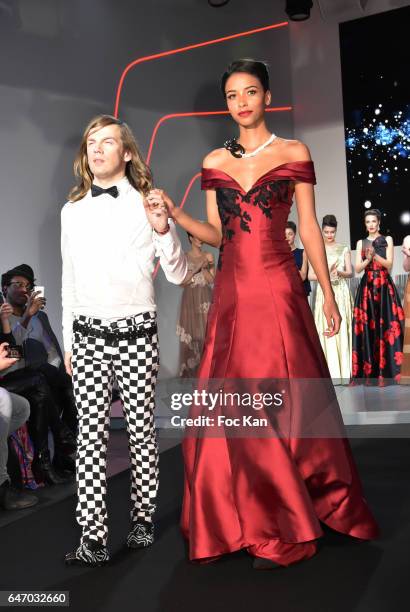 Christophe Guillarme and Flora Coquerel walk the runway during the Christophe Guillarme show as part of the Paris Fashion Week Womenswear Fall/Winter...
