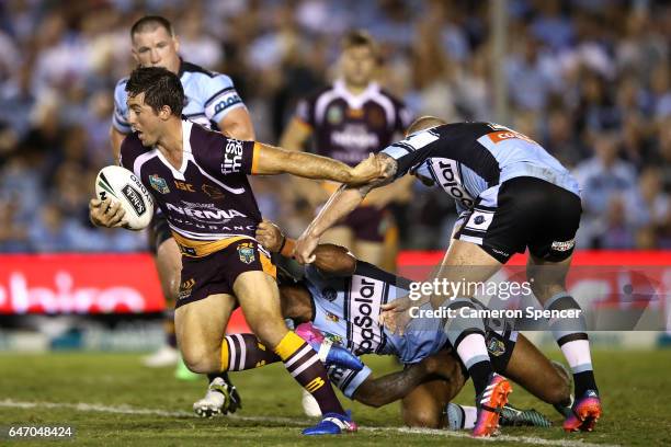 Ben Hunt of the Broncos makes a break during the round one NRL match between the Cronulla Sharks and the Brisbane Broncos at Southern Cross Group...