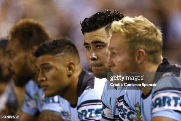 Andrew Fifita of the Sharks looks on from the bench during the round one NRL match between the Cronulla Sharks and the Brisbane Broncos at Southern...