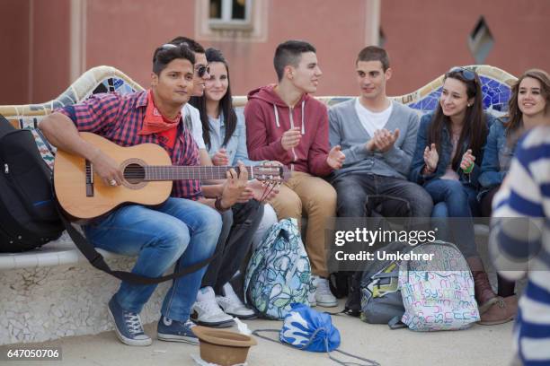 poeple singing and play guitar in park guell - barcelona palau de la musica catalana stock pictures, royalty-free photos & images