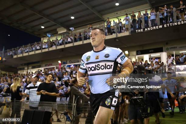 Sharks captain Paul Gallen leads his team onto the field during the round one NRL match between the Cronulla Sharks and the Brisbane Broncos at...