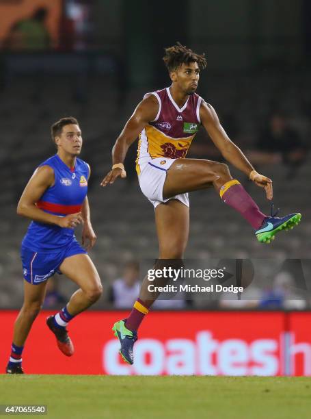 Archie Smith of the Lions kicks the ball during the 2017 JLT Community Series AFL match between the Western Bulldogs and the Brisbane Lions at Etihad...