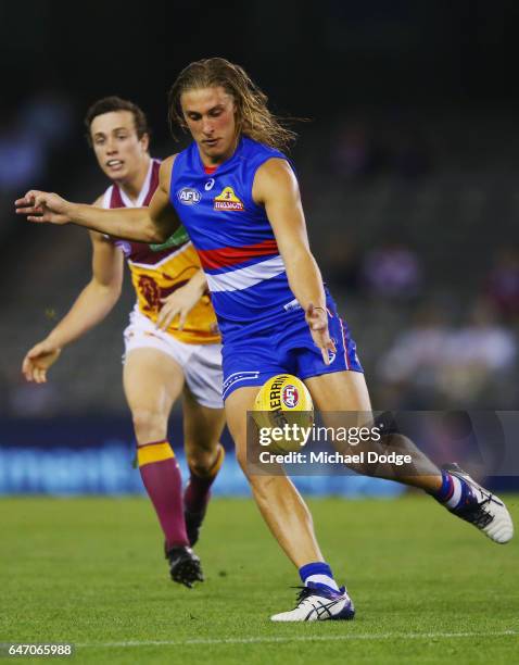 Roarke Smith of the Bulldogs kicks the ball during the 2017 JLT Community Series AFL match between the Western Bulldogs and the Brisbane Lions at...