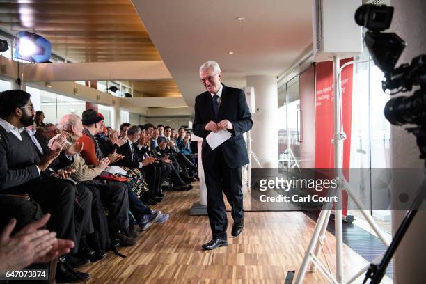 Shadow Chancellor of the Exchequer, John McDonnell, leaves after delivering a speech on the economy ahead of next week's budget, on March 2, 2017 in...