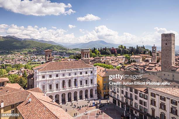 piazza vecchia in bergamo alta, italy. - bergamo stock pictures, royalty-free photos & images