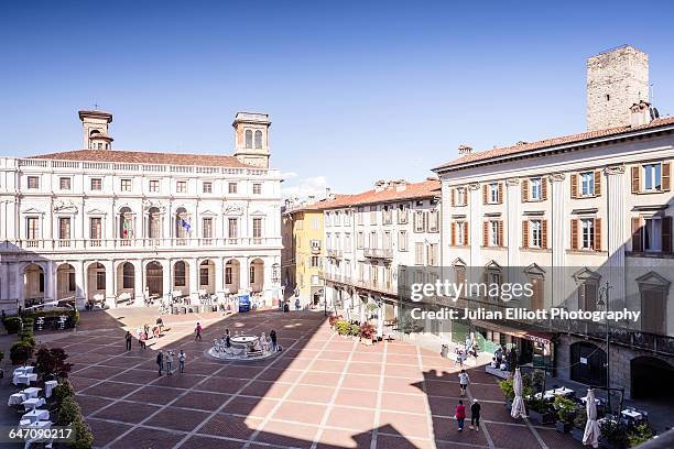 piazza vecchia in bergamo alta, italy. - bergamo alta stock pictures, royalty-free photos & images