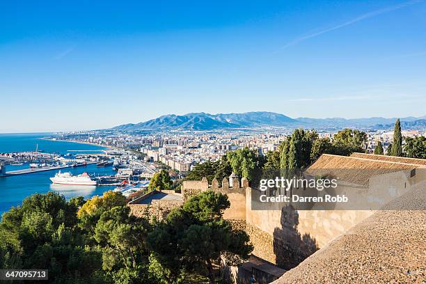 malaga port and castle, costa del sol, spain - malaga fotografías e imágenes de stock