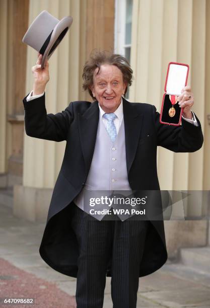 Veteran entertainer Sir Ken Dodd at Buckingham Palace after he was made a Knight Bachelor of the British Empire by the Duke of Cambridge in...