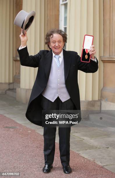 Veteran entertainer Sir Ken Dodd at Buckingham Palace after he was made a Knight Bachelor of the British Empire by the Duke of Cambridge in...