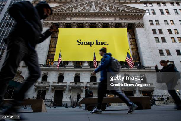 Signage for Snap Inc., parent company of Snapchat, adorns the front of the New York Stock Exchange , March 2, 2017 in New York City. Snap Inc. Priced...