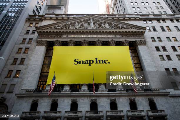 Signage for Snap Inc., parent company of Snapchat, adorns the front of the New York Stock Exchange , March 2, 2017 in New York City. Snap Inc. Priced...