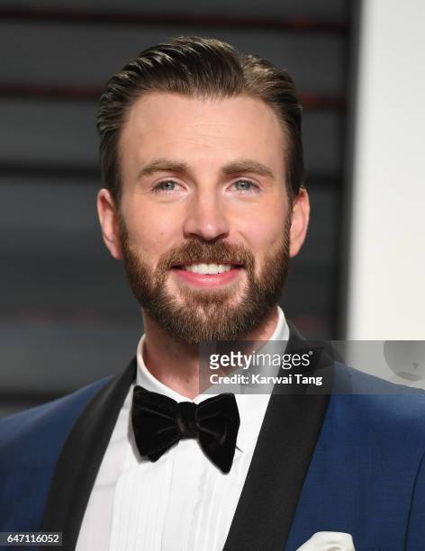 Chris Evans arrives for the Vanity Fair Oscar Party hosted by Graydon Carter at the Wallis Annenberg Center for the Performing Arts on February 26,...