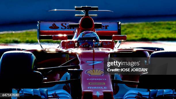 Ferrari's Finnish driver Kimi Raikkonen drives at the Circuit de Catalunya on March 2, 2017 in Montmelo, on the outskirts of Barcelona during the...