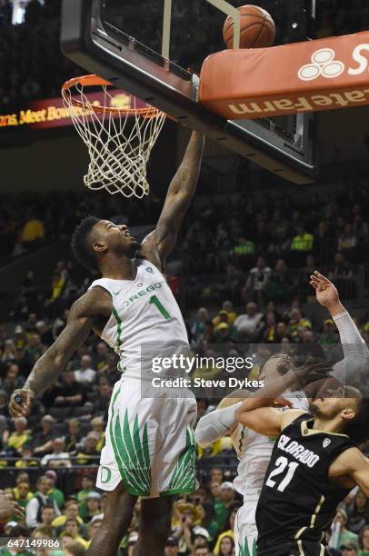 Jordan Bell of the Oregon Ducks goes up to block the shot of Derrick White of the Colorado Buffaloes in the second half of the game at Matthew Knight...