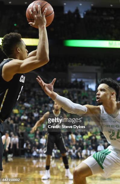 Dillon Brooks of the Oregon Ducks plays defense in the first half of the game against the Colorado Buffaloes at Matthew Knight Arena on February 18,...