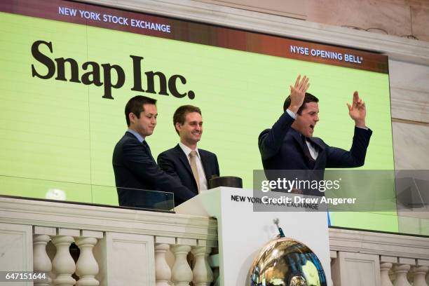 Snapchat co-founders Bobby Murphy, chief technology officer of Snap Inc., and Evan Spiegel, chief executive officer of Snap Inc., ring the opening...