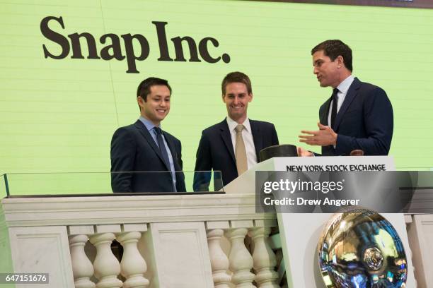 Snapchat co-founders Bobby Murphy, chief technology officer of Snap Inc., and Evan Spiegel, chief executive officer of Snap Inc., prepare to ring the...