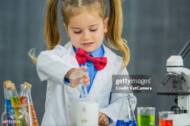 mixing chemicals - small smart girl stock pictures, royalty-free photos & images