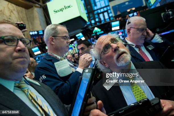 Traders wait for shares of Snap Inc. To open for trading on the floor of the New York Stock Exchange , March 2, 2017 in New York City. Snap Inc....