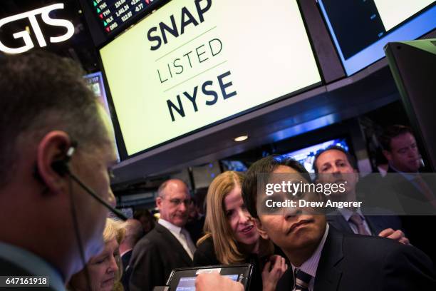 Imran Khan , chief strategy officer of Snap Inc., waits for shares to open for trading on the floor of the New York Stock Exchange , March 2, 2017 in...