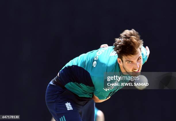 England's Steven Finn delivers a ball during a practice session at the Sir Vivian Richards Stadium in St. John's, Antigua, on March 2, 2017. England...