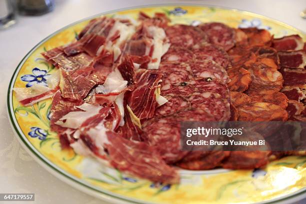 a traditional spanish cold cuts plate - chorizo stock pictures, royalty-free photos & images