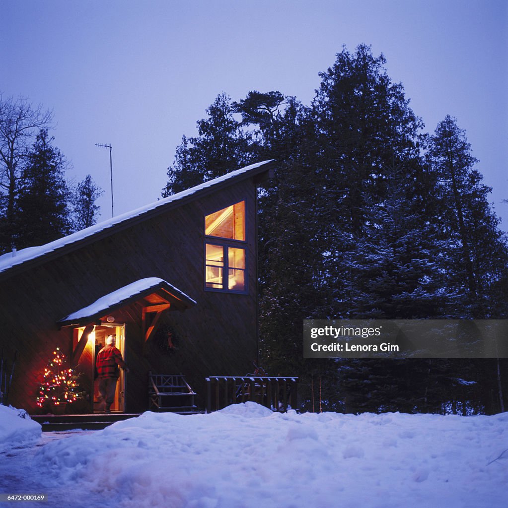 Cabin in Snow at Night