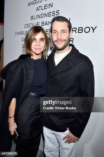 Carine Roitfeld and Simon Porte Jacquemus attend the Cocktail Reception For The LVMH PRIZE 2017 on March 2, 2017 in Paris, France.