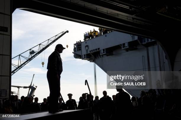 President Donald Trump arrives to speak aboard the pre-commissioned USS Gerald R. Ford aircraft carrier in Newport News, Virginia, March 2, 2017.