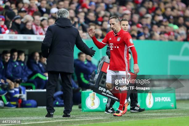 Head coach Carlo Ancelotti of Bayern Muenchen shakes hands with Franck Ribery of Bayern Muenchen during the DFB Cup quarter final between Bayern...