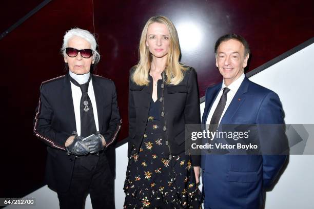 Karl Lagerfeld,Delphine Arnault and Jean-Paul Claverie attend the Cocktail Reception For The LVMH PRIZE 2017 on March 2, 2017 in Paris, France.