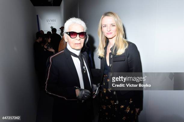 Karl Lagerfeld and Delphine Arnault attend the Cocktail Reception For The LVMH PRIZE 2017 on March 2, 2017 in Paris, France.