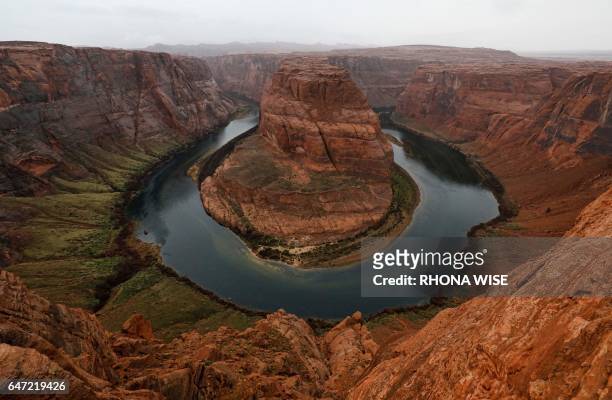 The Colorado River wraps around Horseshoe Bend in the in Glen Canyon National Recreation Area in Page, Arizona, on February 11, 2017.