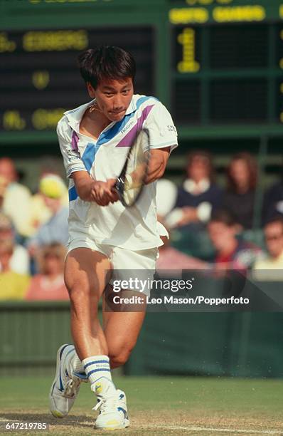 American tennis player Michael Chang pictured in action competing to reach the fourth round in the Men's Singles tournament at the Wimbledon Lawn...