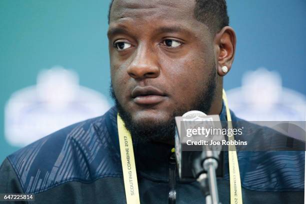 Offensive lineman Cam Robinson of Alabama answers questions from the media on Day 2 of the NFL Combine at the Indiana Convention Center on March 2,...